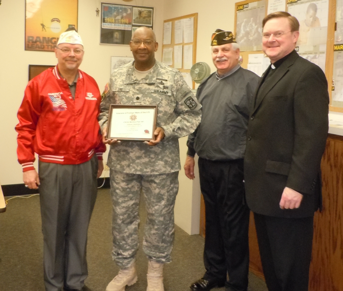 Presentation to Col. Lee and Father Stephan Boes